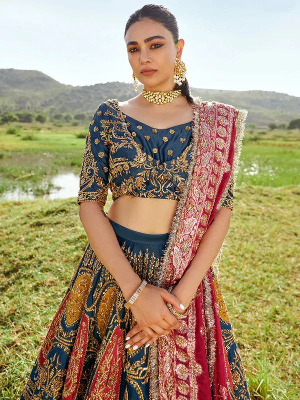 Admiral blue raw silk lehenga with fuchsia detailing