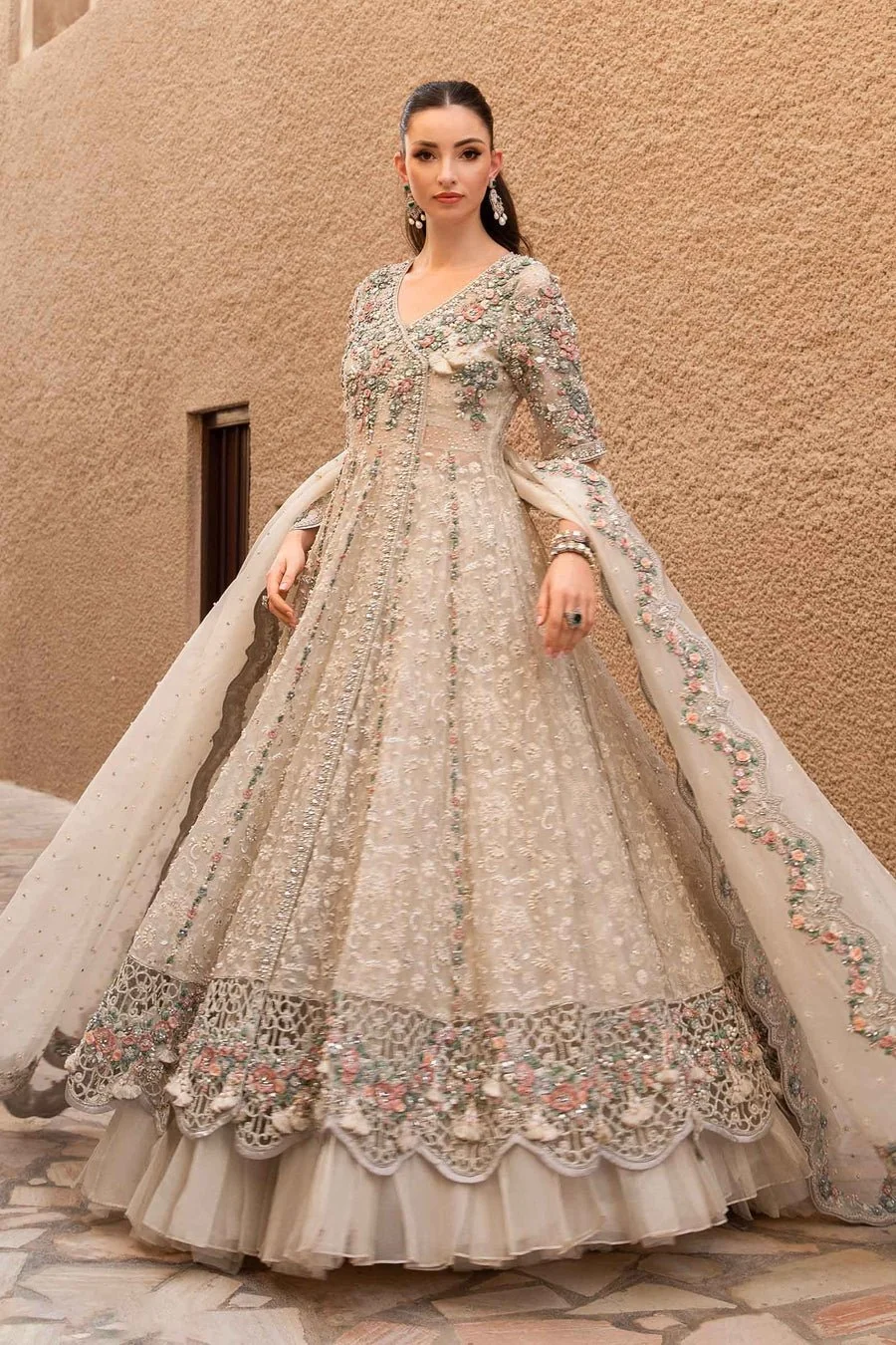 Beige formal frock with sequins pearls and dabka work