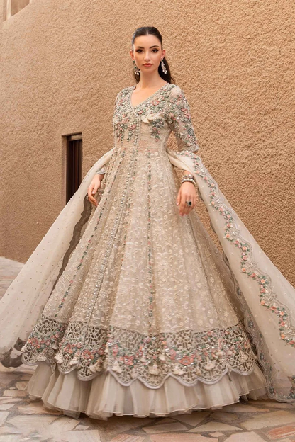 Beige formal frock with sequins pearls and dabka work