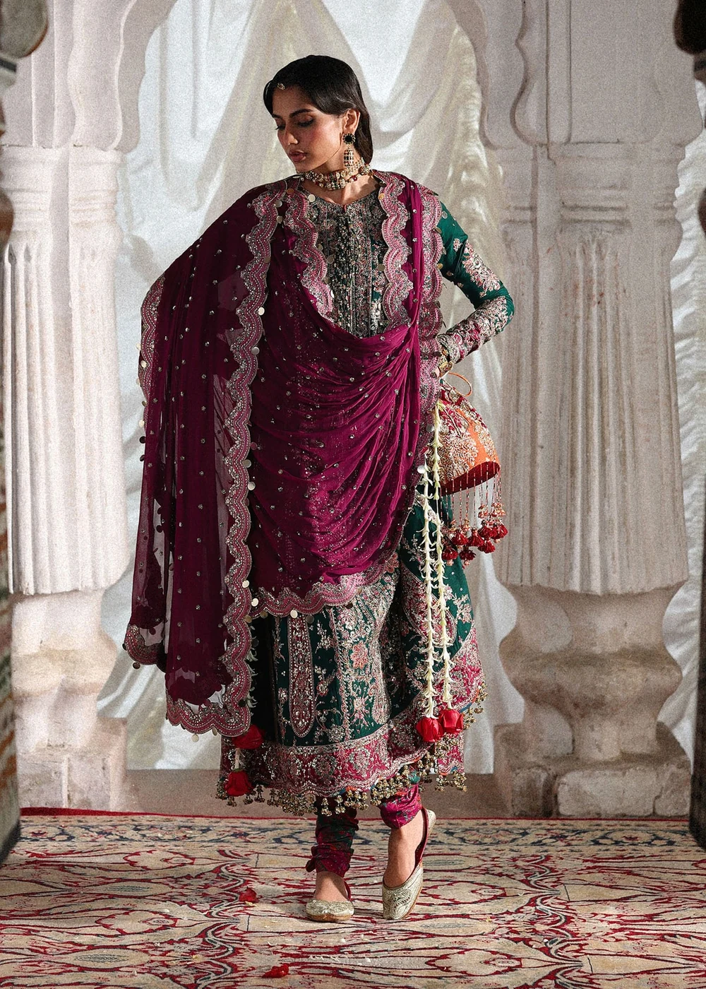 Bottle green outfit with intricate floral embroidery