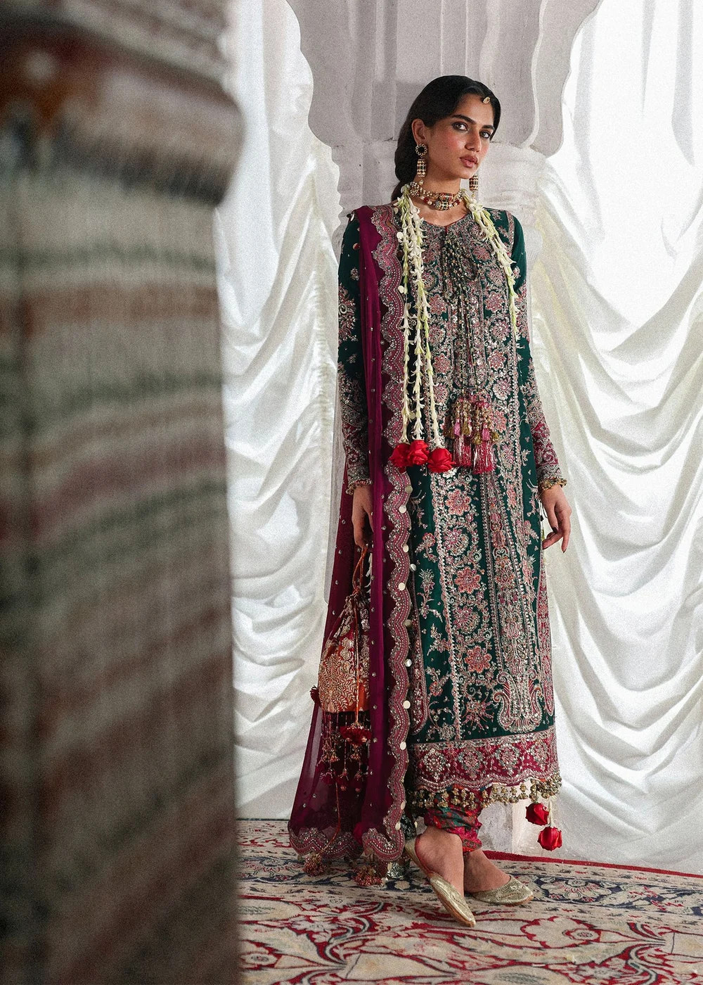 Bottle green embroidered ensemble with statement borders