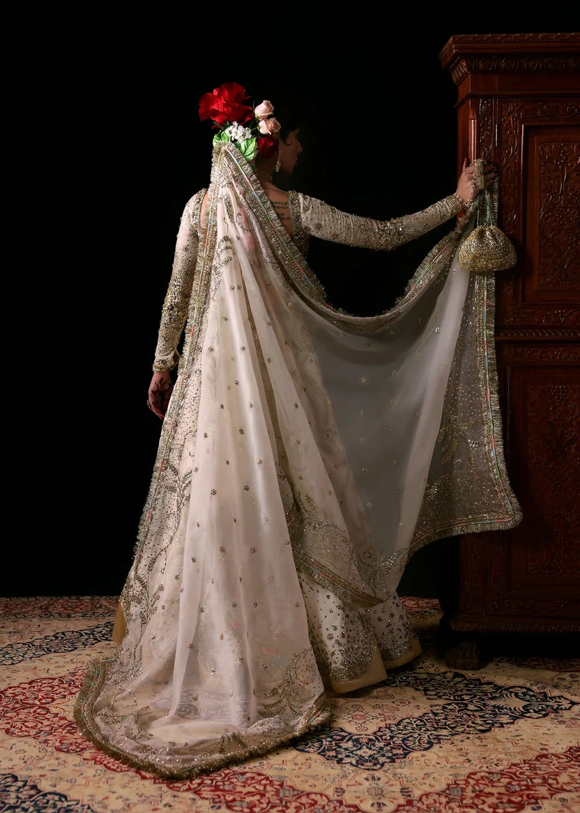 Oak-white bridal outfit with gold and silver embroidery