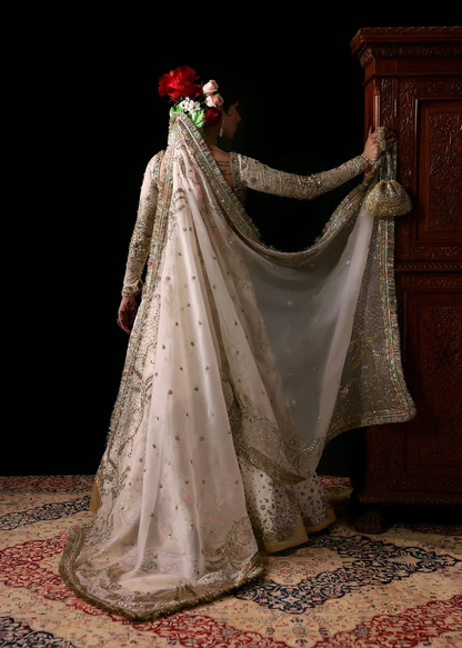 Oak-white bridal outfit with gold and silver embroidery