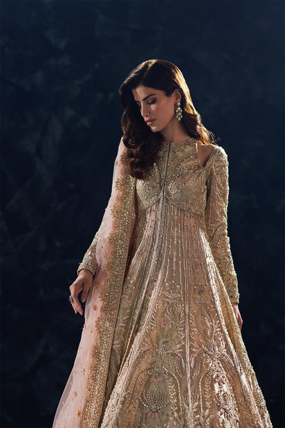 Champagne gold flared gown with hand embellishment