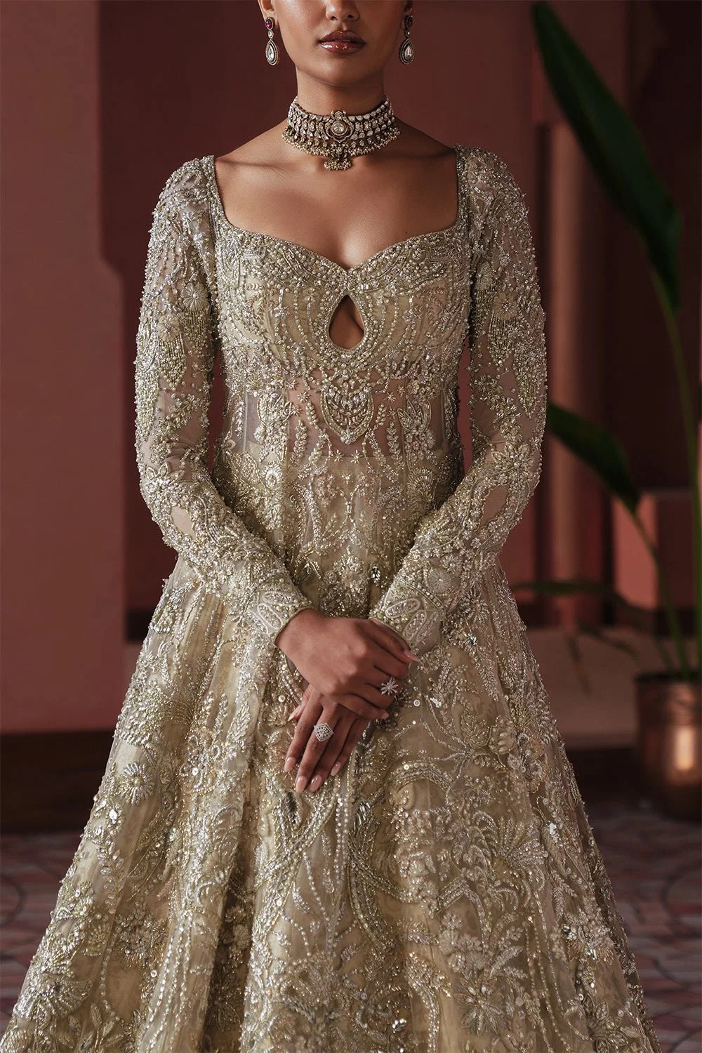 Champagne Pakistani wedding outfit with hand embellishment