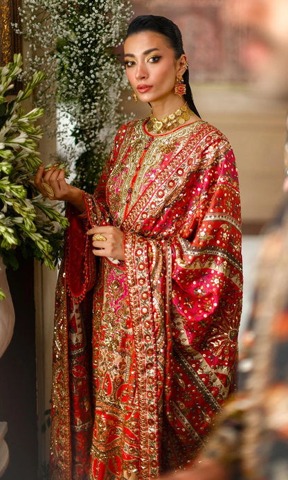 Crimson Pakistani formal wear with intricate embroidery