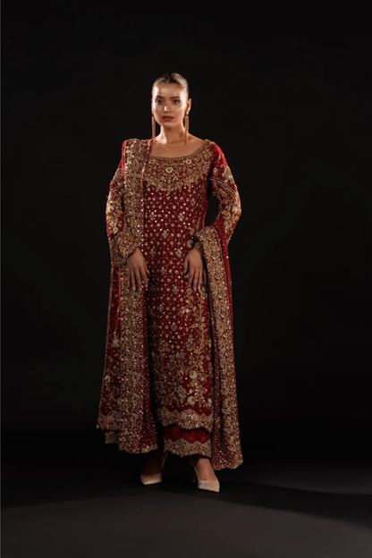 Deep crimson outfit with gold and silver handwork