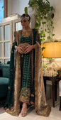 Deep emerald green formal dress with zardozi, dabka and maroon bordered dupatta
