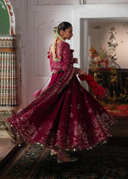 Magenta embroidered silk skirt with floral motifs