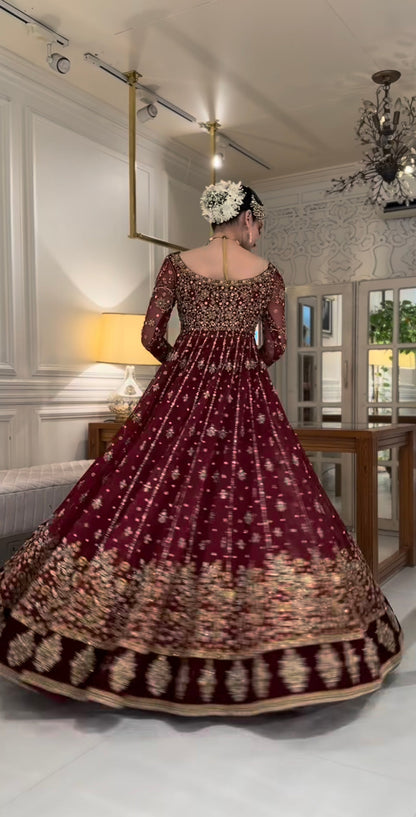 Deep maroon bridal dress with zardozi, dabka and hand-worked detailing