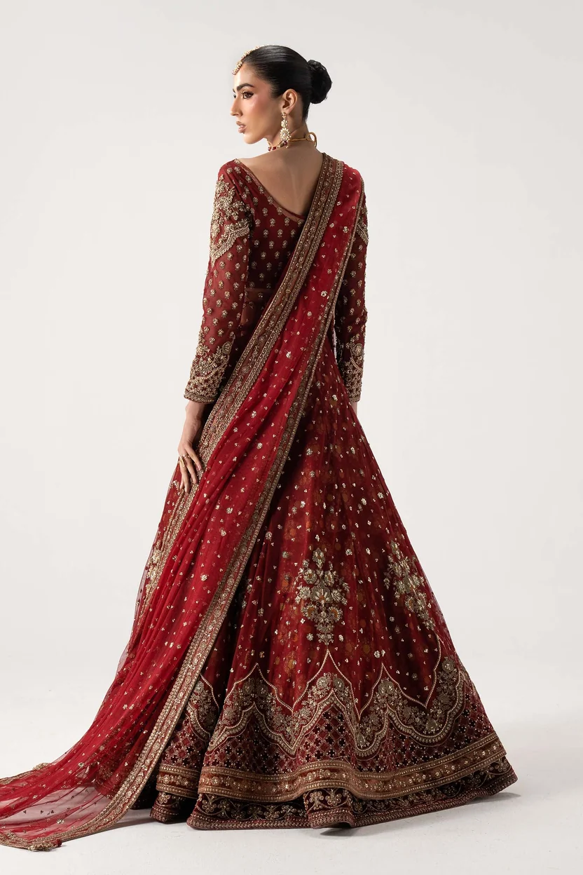 Pakistani bridal lehenga in deep red with gold embroidery