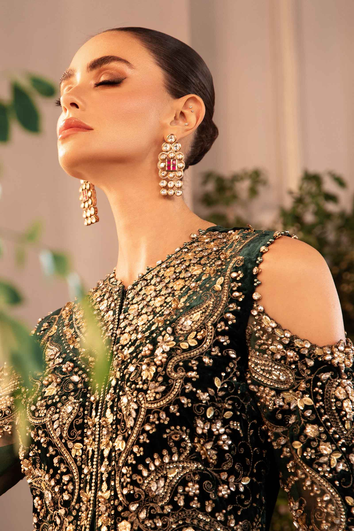 Pakistani embroidered velvet suit with detailed organza panels