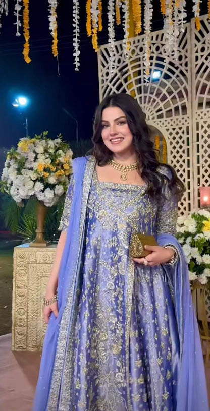 Luxury blue formal dress featuring zardozi and dabka craftsmanship
