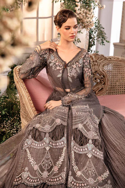 Grey Pakistani formal dress with embroidered border