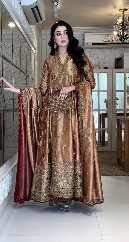 Haris Shakeel Aswad with intricate adda work and hand embellishments