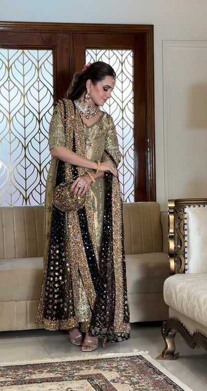 Soft pistachio green formal dress with zardozi, dabka and black embellished dupatta
