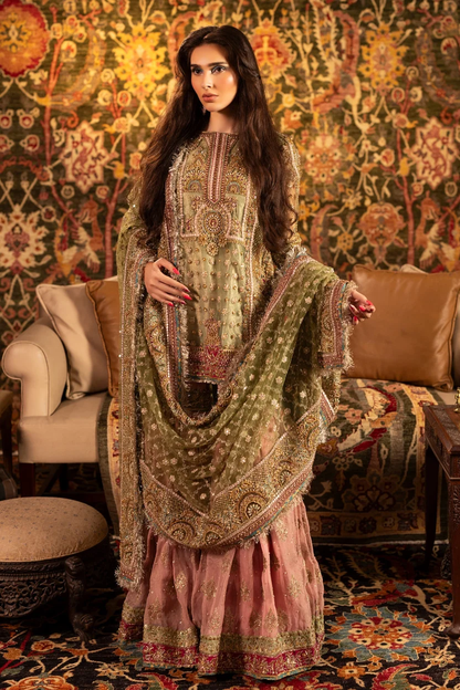 Pistachio-green kurti with intricate gold gotta work