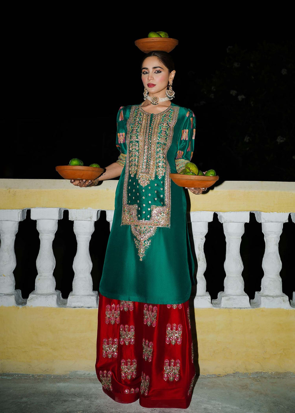 Emerald green embroidered Pakistani designer outfit
