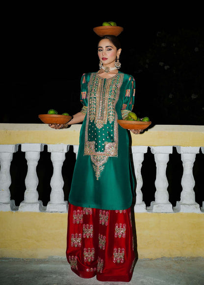 Emerald green embroidered Pakistani designer outfit

