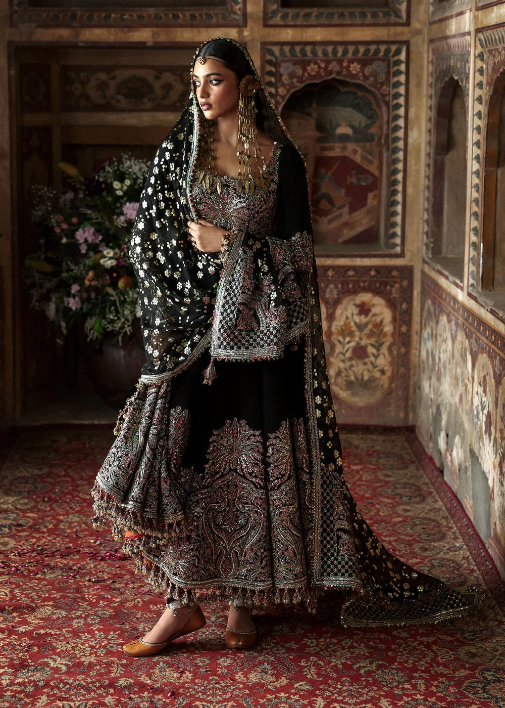 Black Pakistani designer dress with intricate adda work