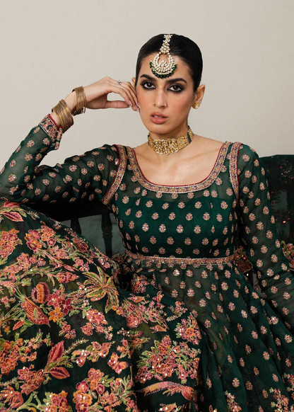 Dark green Hara peshwas featuring pink and gold embroidered motifs
