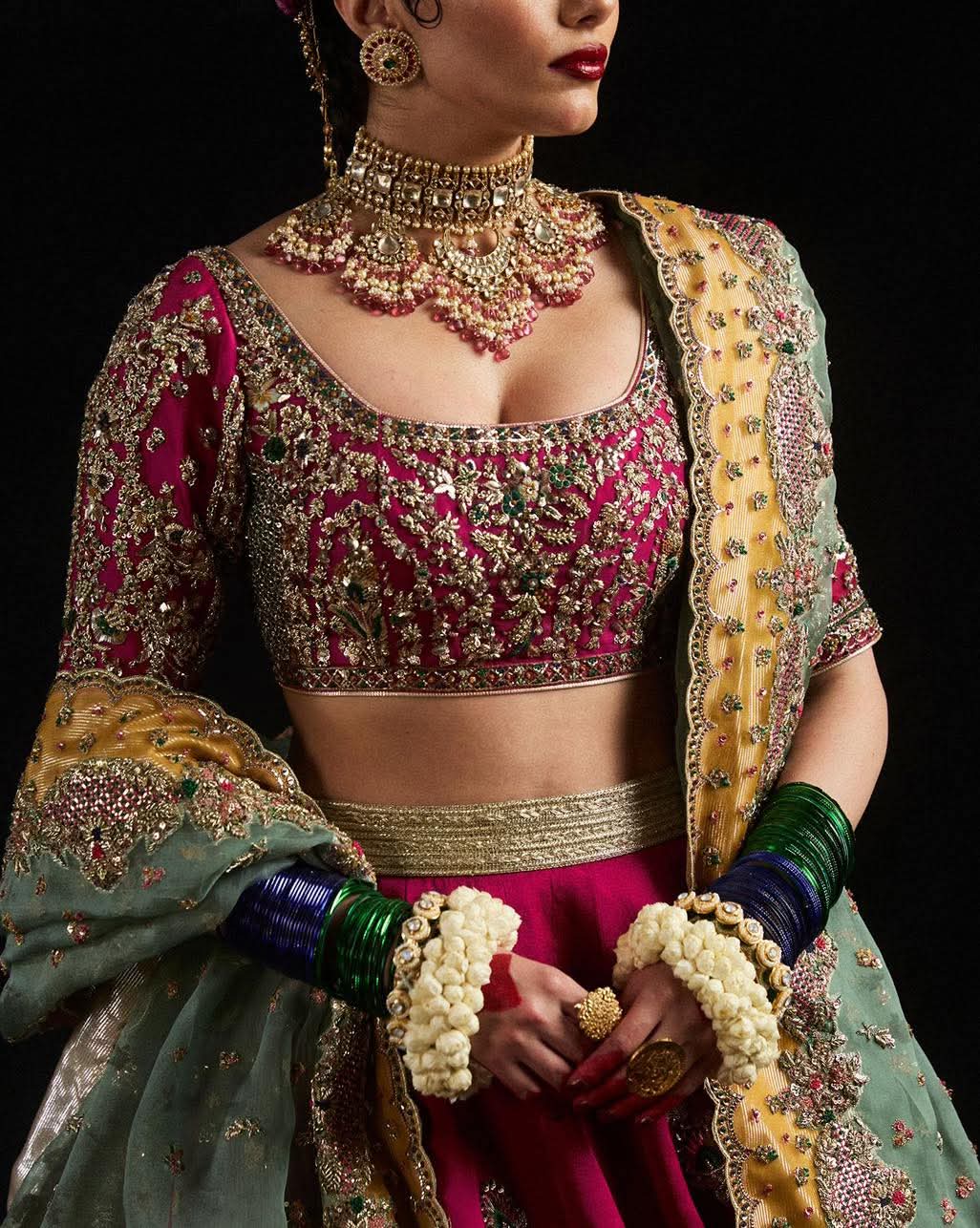 Laal magenta blouse with gold floral hand embellishment