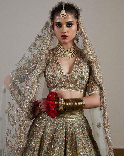 Sawara emerald-green shirt with intricate gold hand embroidery
