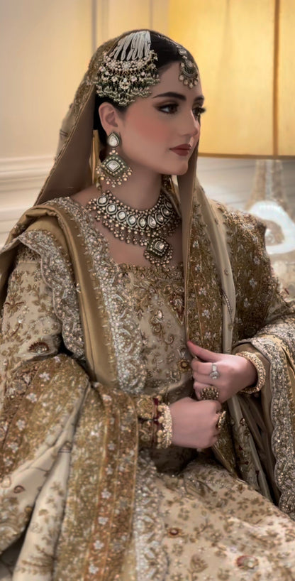 Ivory gold bridal dress with zardozi, dabka and naqshi work
