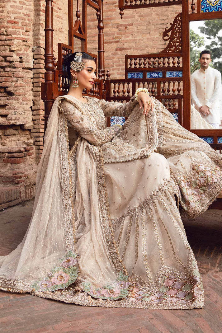 Ivory embroidered outfit with embellished mukesh dupatta