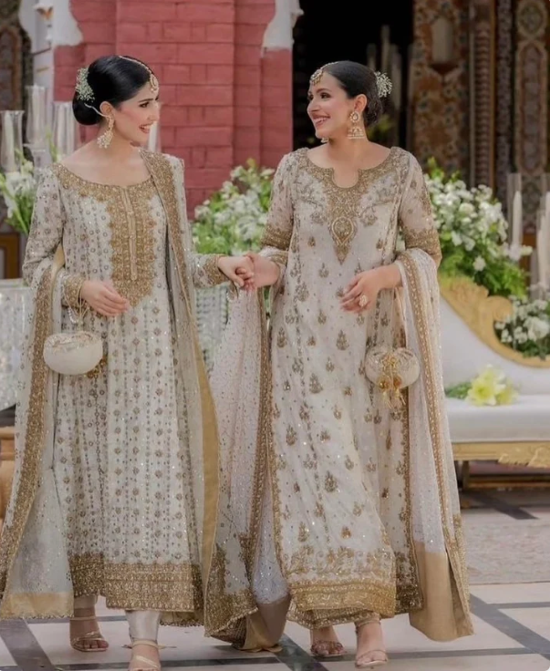 Ivory white bridal dress with zardozi, dabka and antique gold detailing