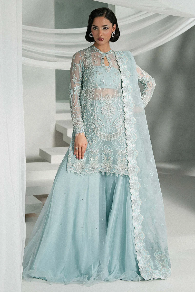 Frozen-blue shirt with intricate silver-blue floral embroidery