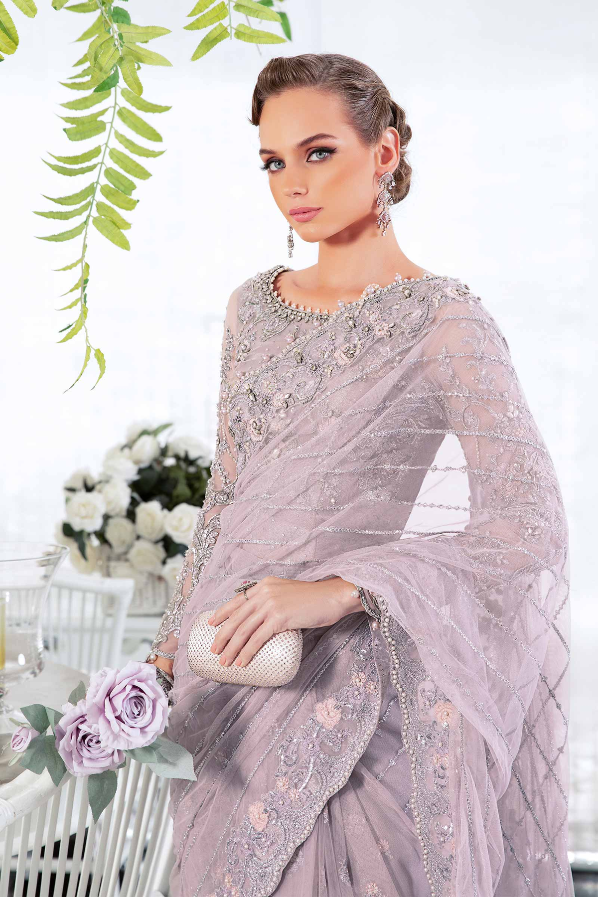Lilac saree with pearls stones and naqshi embroidery