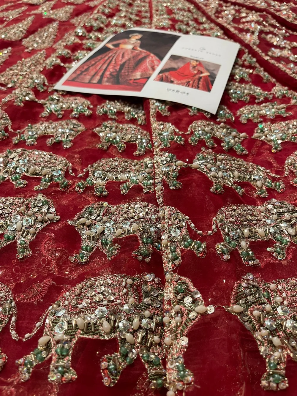 Deep red bridal lehenga with embellished dupatta
