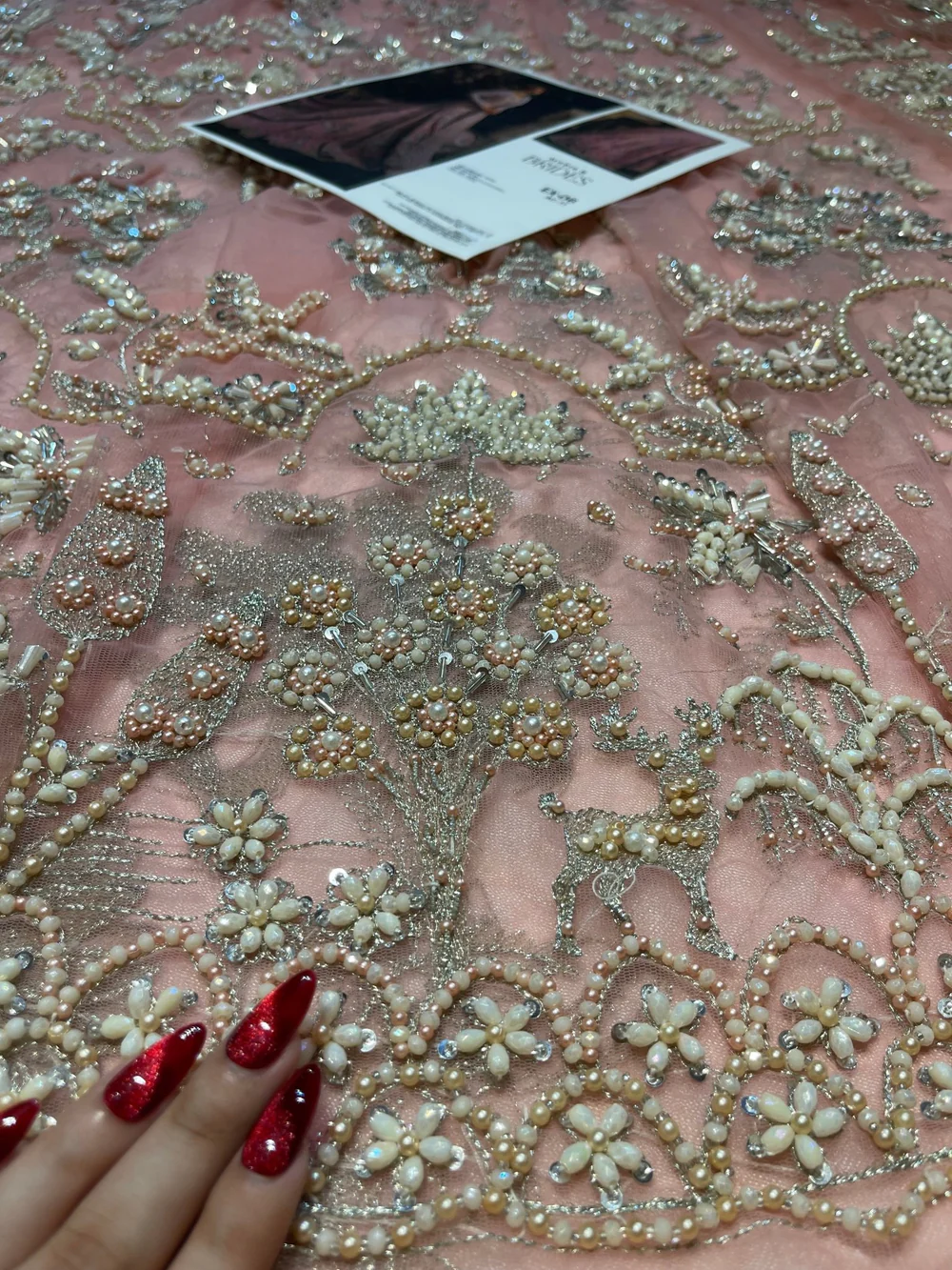 Dusty blush pink bridal lehenga with embellished dupatta
