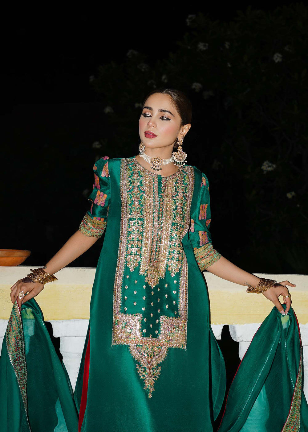 Pakistani wedding guest dress in emerald green
