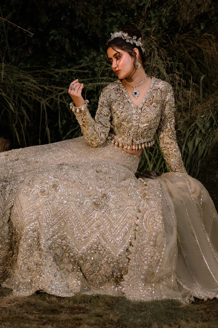 Maria.B Azureh lehenga featuring geometric motifs and scalloped borders
