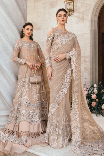 Beige embroidered Pakistani saree with organza blouse