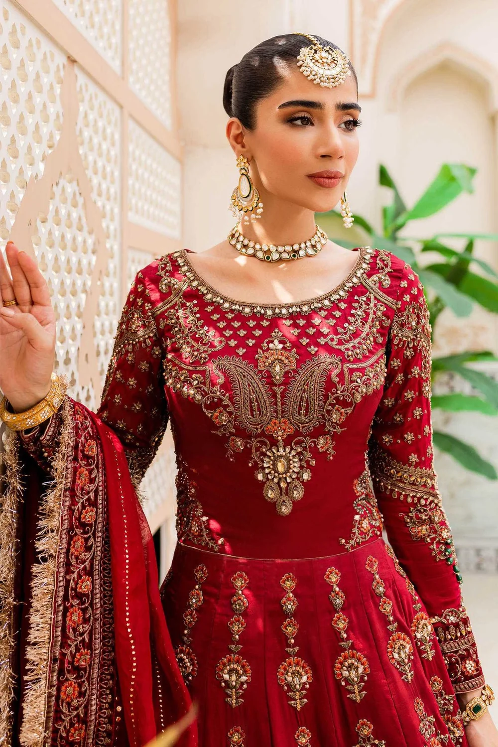 Red Pakistani bridal lehenga with embroidered dupatta