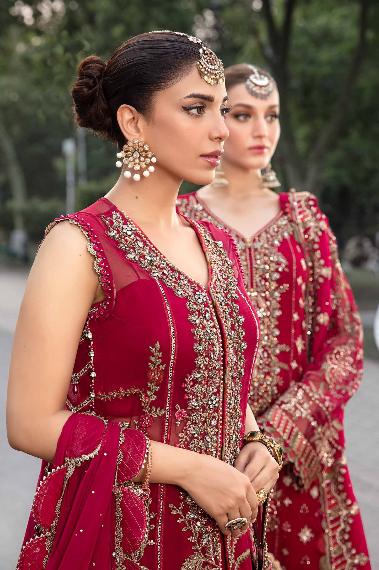 Bright pink Pakistani chiffon suit with hand embellishment