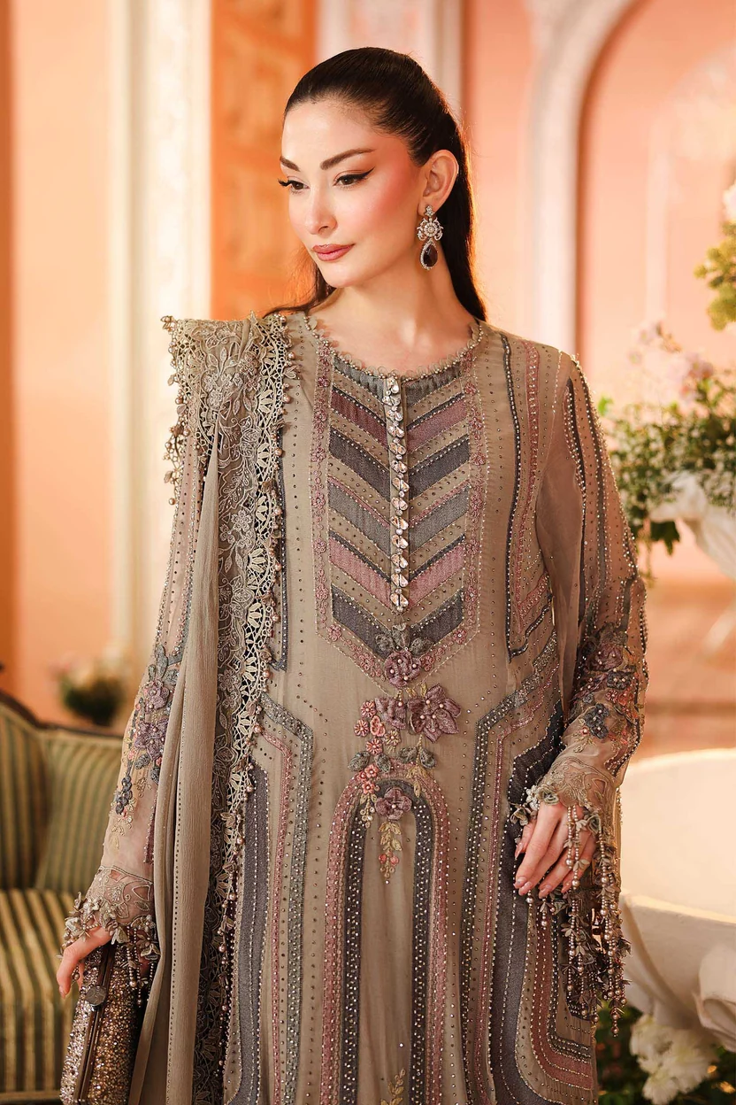 Floral lace hem with dangling embellishments on taupe-grey kameez