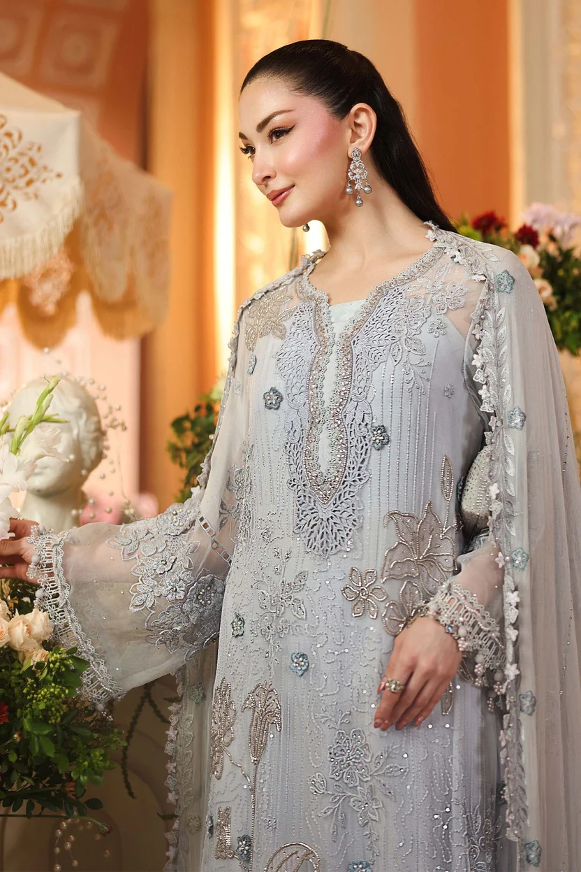 Sheer sleeves with embroidered panels and detailed lace cuffs