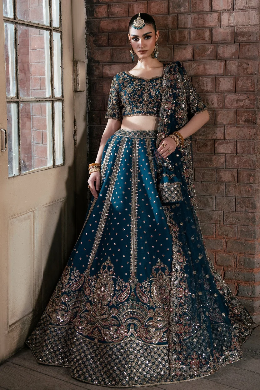 Mina Kashif Tabassum deep teal Pakistani bridal lehenga choli
