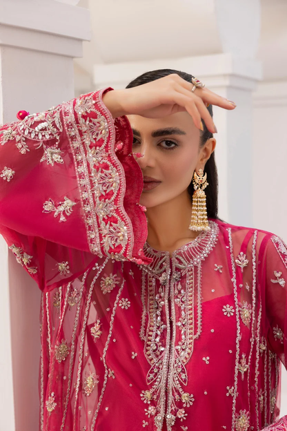 Shocking-pink sharara paired with an embroidered kameez