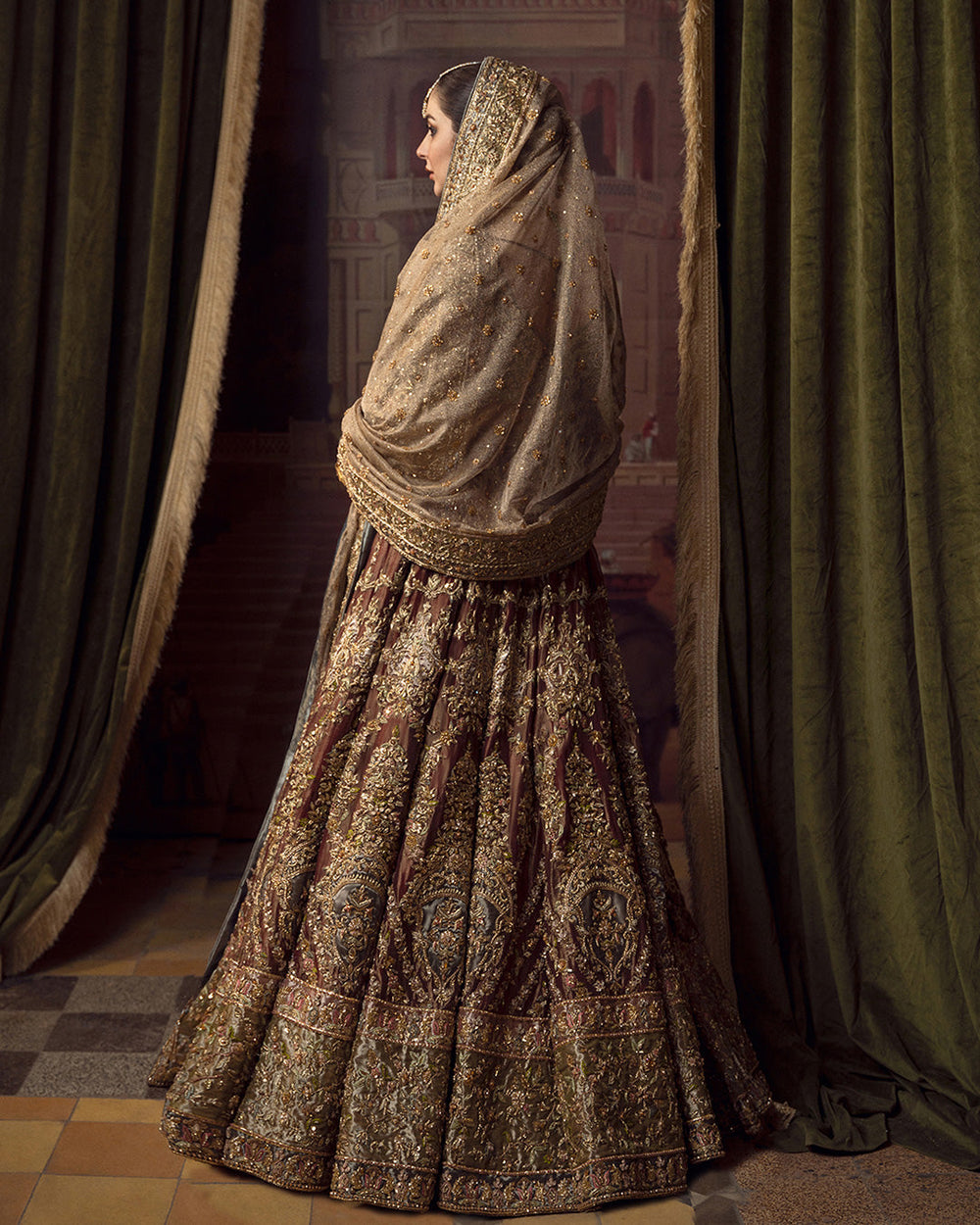 Antique gold bridal lehenga with intricate tilla and handwork