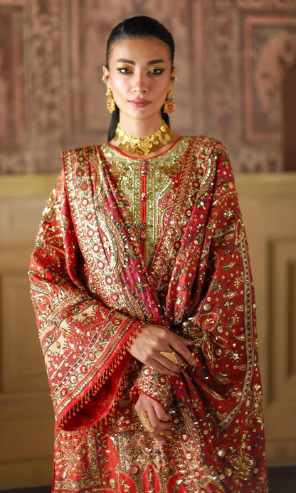 Heavily worked crimson sleeves and detailed borders