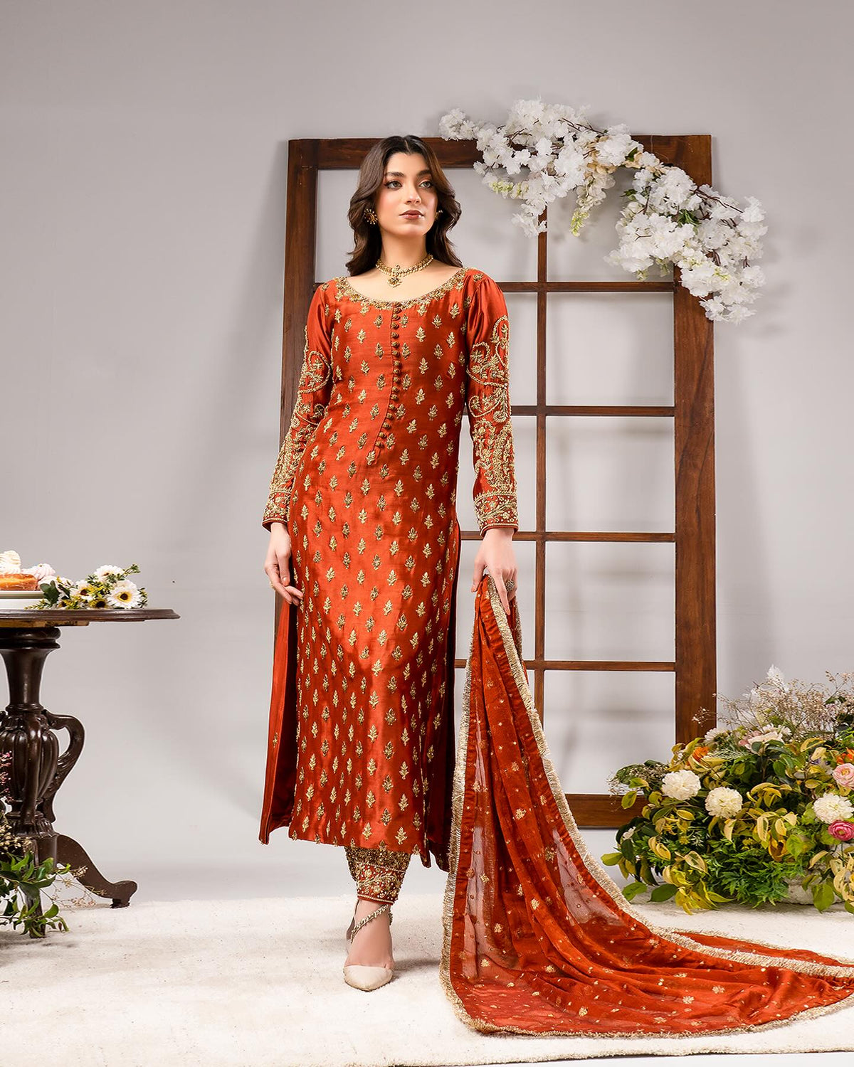 Ahmad Sultan inspired tangerine formal wear
