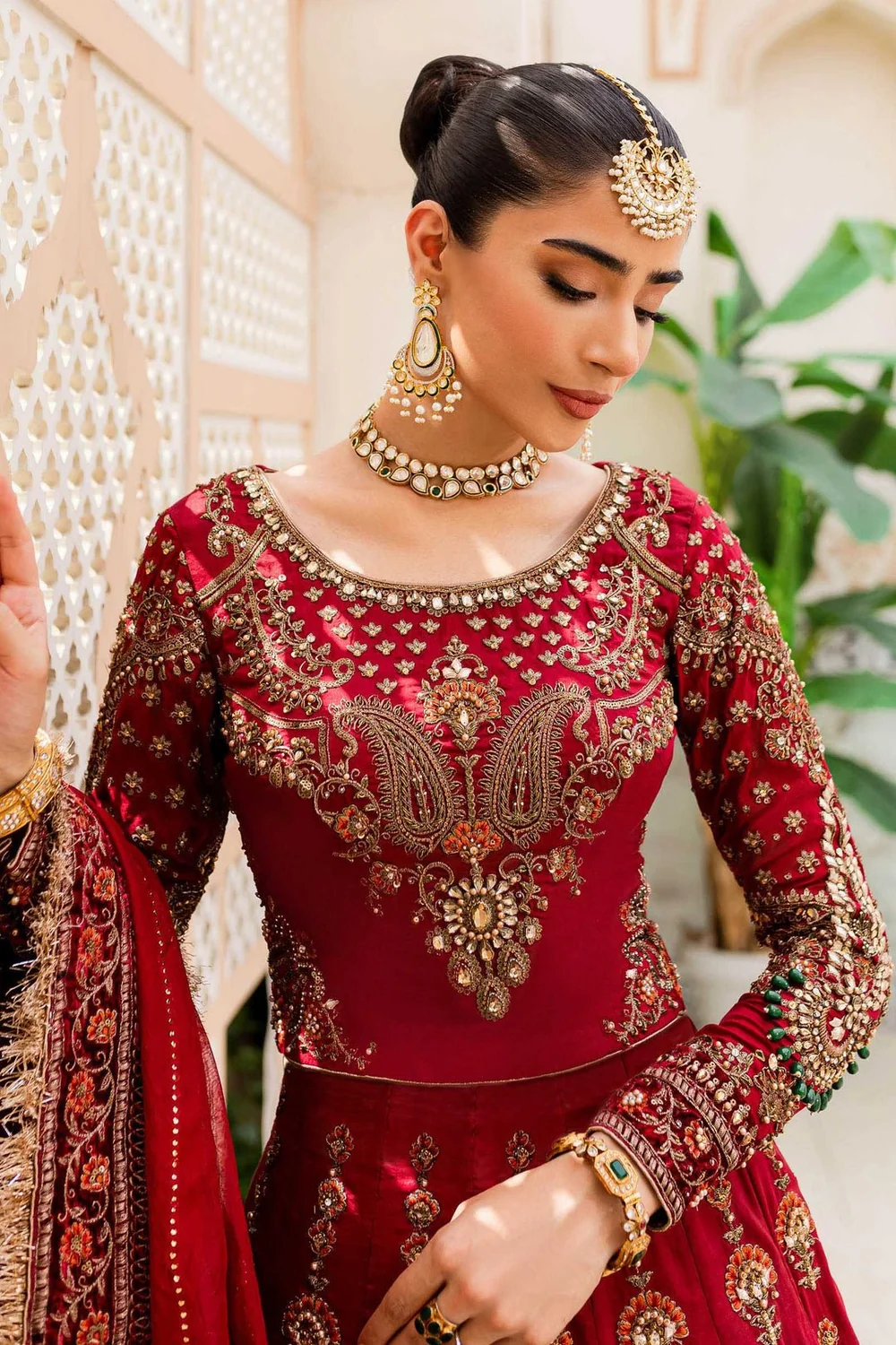 Designer inspired red gold bridal dress