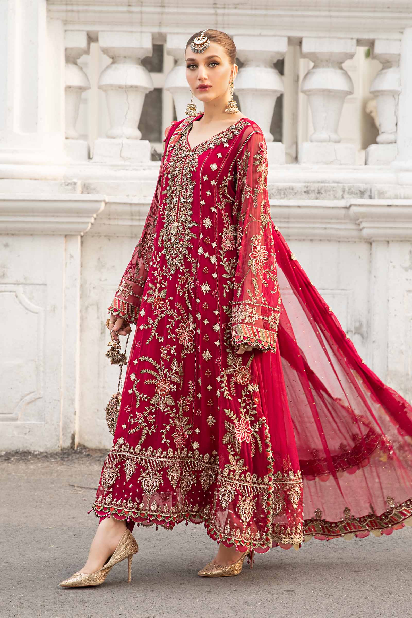 Bright pink Pakistani formal suit with embroidered dupatta