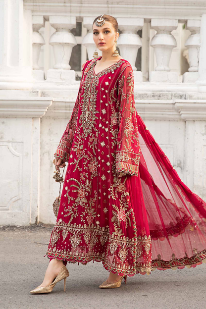Bright pink Pakistani formal suit with embroidered dupatta