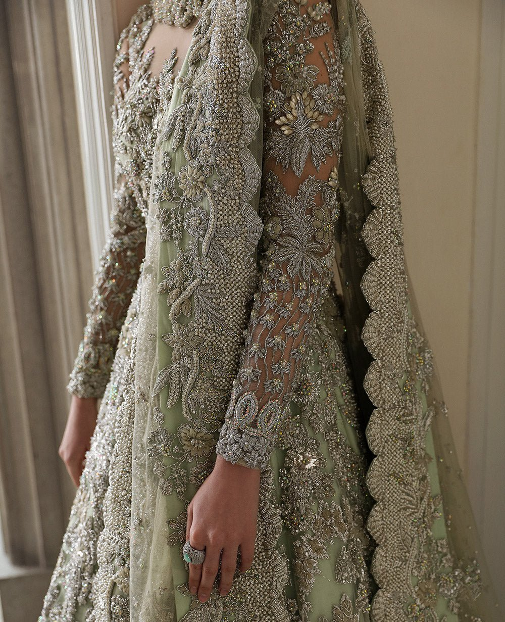 Pistachio green dress with intricate floral embroidery